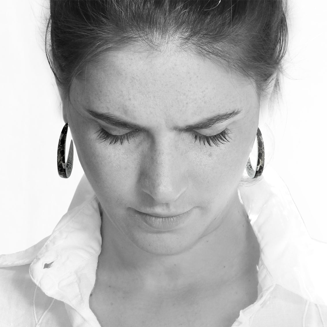 CORINNE SILVER AND BLACK STATEMENT LOOP EARRINGS - SD249