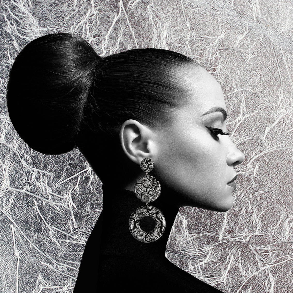 ATHENA TRIPLE OPEN  DISC STATEMENT EARRINGS - ST052